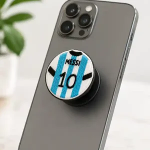 smartphone with messi pop socket